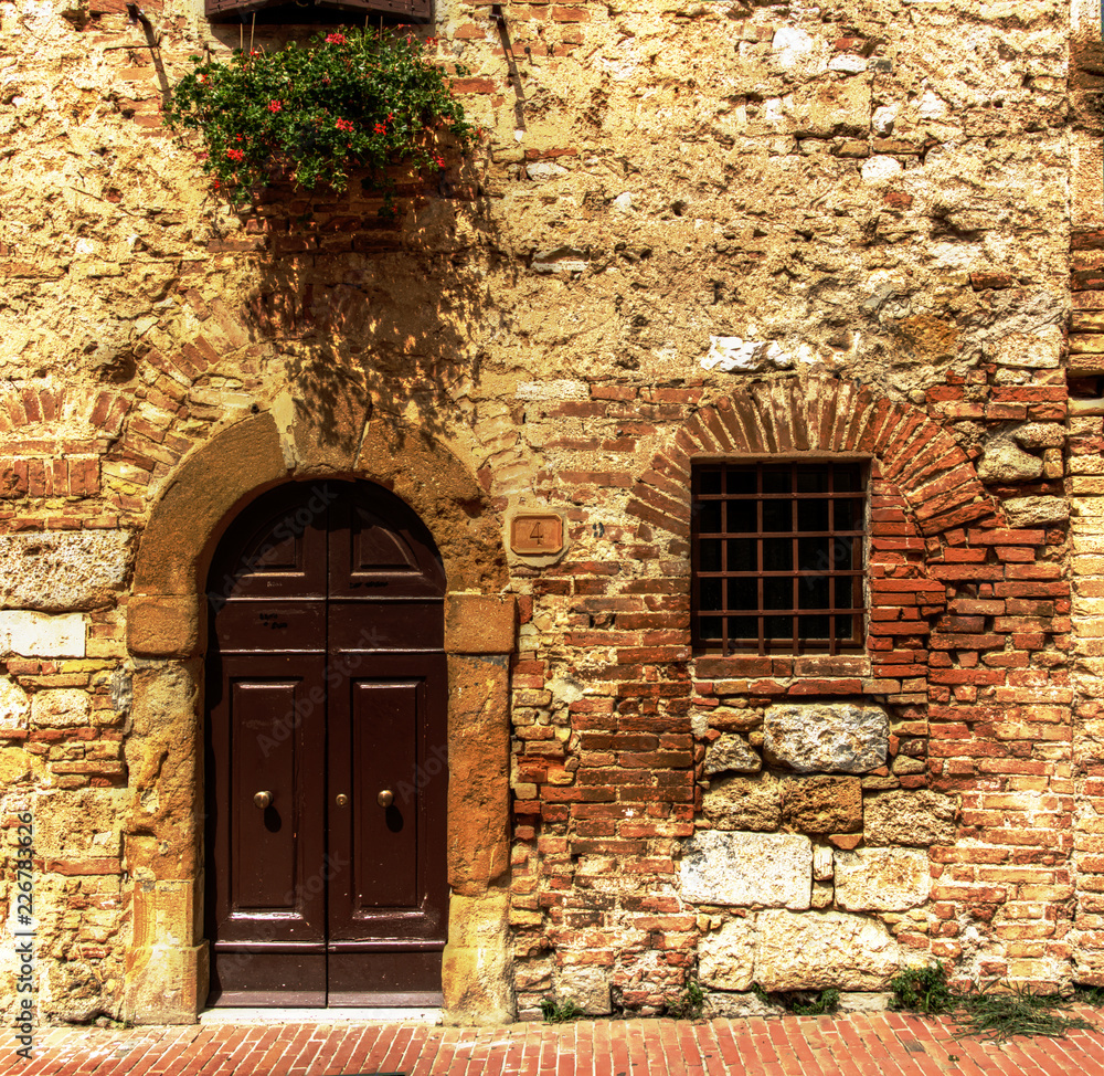 Brick wall and doorway, Siena, Tuscany