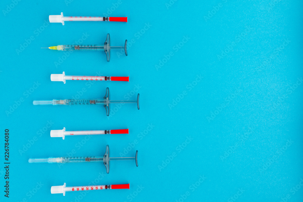 Flat lay of medical instruments on blue background. Mock up health care medical background. Flat lay of medical instruments on blue background. Mock up health care medical background.