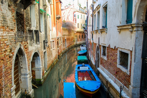 Line of boats in a Venice Neighborhood Canal