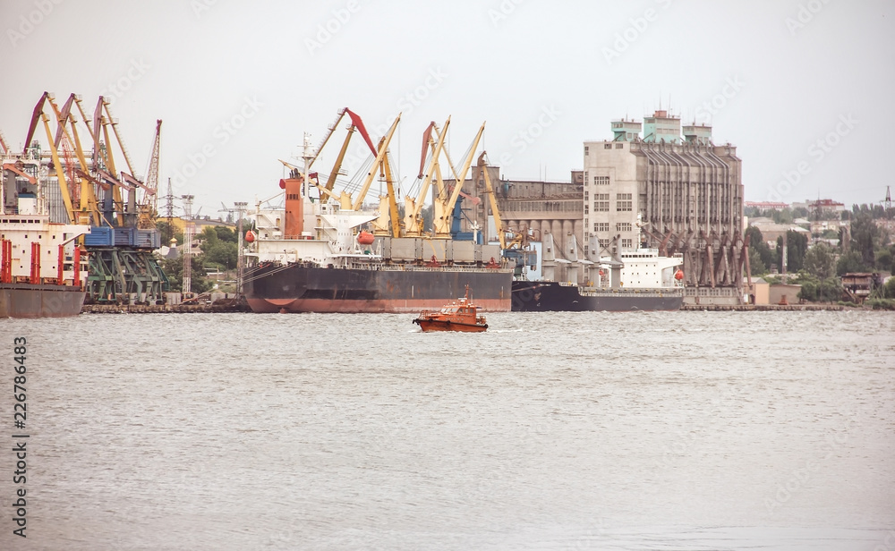 Old ships for grain transportation. Transportation of agricultural products. Soft focus