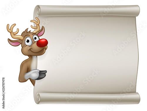 Santas Reindeer Christmas cartoon character peeking around and pointing at a scroll banner sign