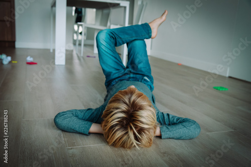 Bild auf Leinwand child relax at home, comfort and laziness
