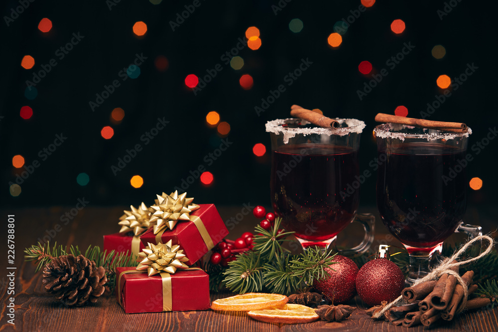 Glasses of mulled wine on wooden table Glasses of mulled wine on wooden table