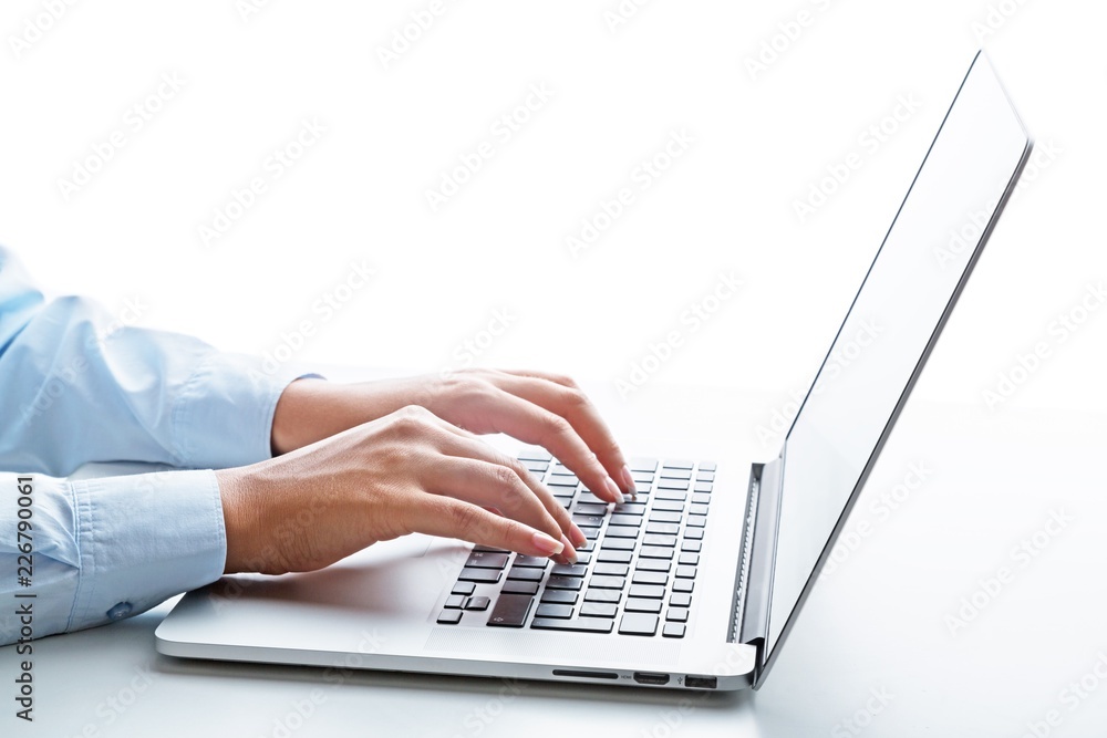 Closeup of a Businesswoman Typing on a Laptop Closeup of a Businesswoman Typing on a Laptop