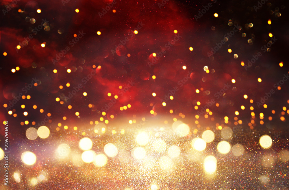 Red, black and gold glitter lights background. defocused. Red, black and gold glitter lights background. defocused.