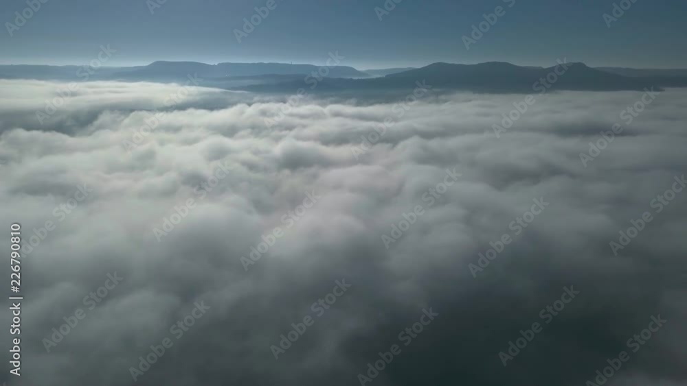 Flight above and through clouds. Aerial Flight above and through clouds. Aerial