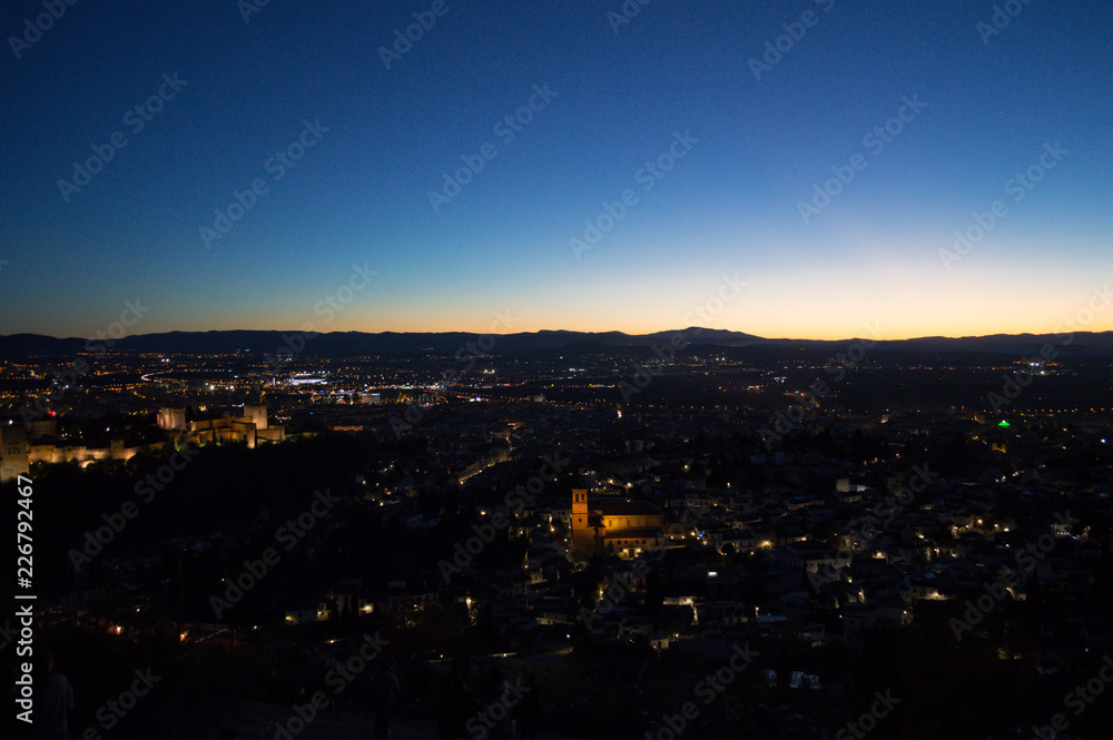 Panorama of Granada, Alhambra and Sierra Nevada with Afterglow seen from Sacromonte Hill, Spain