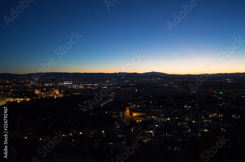 Panorama of Granada, Alhambra and Sierra Nevada with Afterglow seen from Sacromonte Hill, Spain