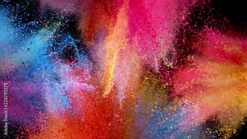 Super slow motion of coloured powder explosion isolated on black background. Filmed on high speed cinema camera, 1000fps.
