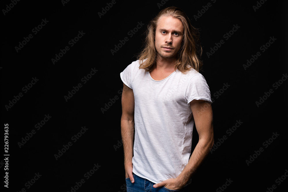 handsome young and fit man posing in casual clothes handsome young and fit man posing in casual clothes
