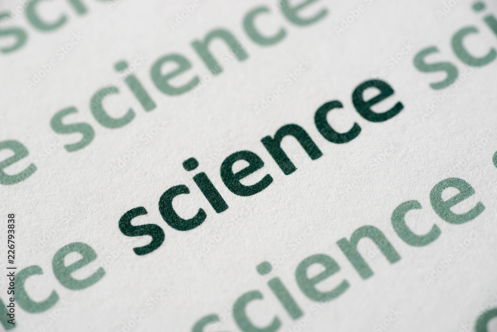 word  science printed on paper macro