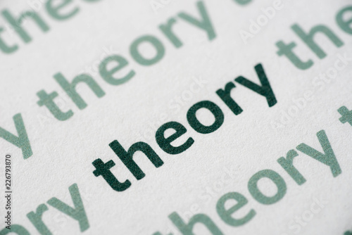 word  theory printed on paper macro photo
