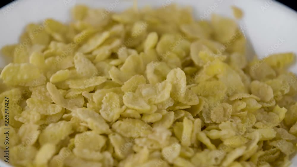 Corn flakes in a spinning bowl Corn flakes in a spinning bowl