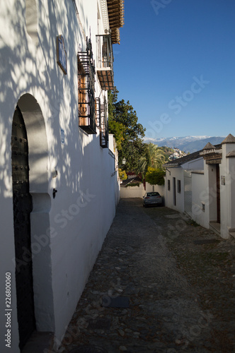 Alleyway with Sierra Nevada Backdrop in Historic Center of Granada, Spain