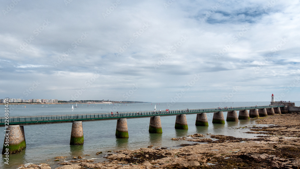 view of the jetty and the lighthouse of Les Sables d'Olonne, France