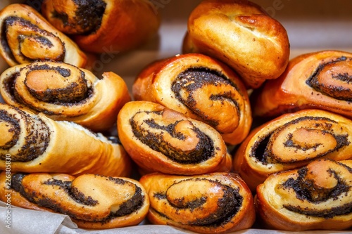 fresh rolls with poppy seeds photo