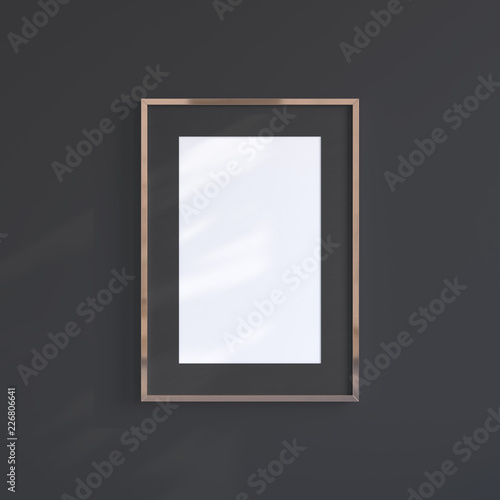 Copper blank frame on the black wall. Frame mock up.
