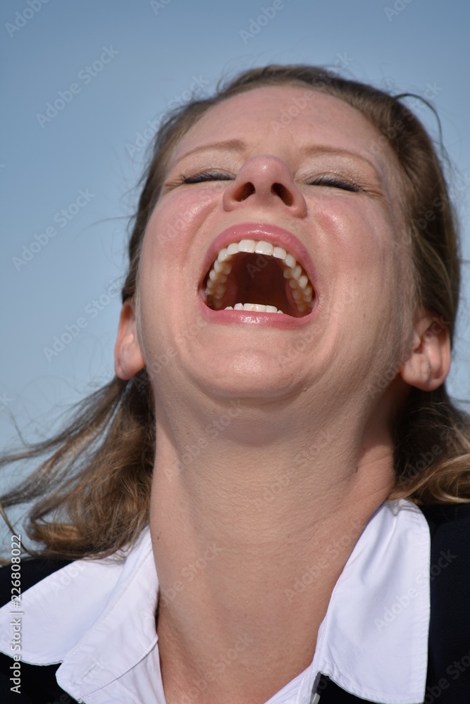 Business Woman And Laughter Wearing Suit Business Woman And Laughter Wearing Suit