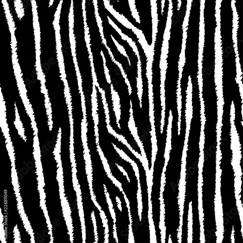 Tiger or zebra seamless pattern. Grunge animal skin. Black and white vector illustration background. Trendy fabric design.