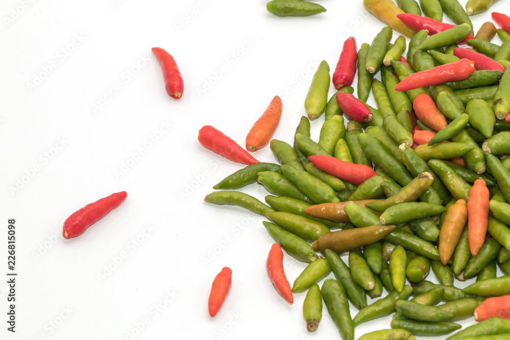 Red and green chilli pepper isolated on white background. common names : Small Chilli Padi, Bird's Eye Chilli in Capsicum annuum Solanaceae family. Red and green chilli pepper isolated on white background. common names : Small Chilli Padi, Bird's Eye Chilli in Capsicum annuum Solanaceae family.