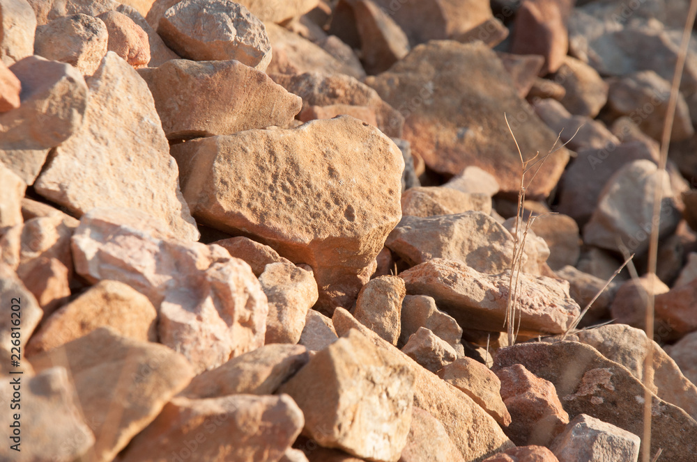 big pile of rocks and boulders piled with beautiful sunset light, big pile of rocks and boulders piled with beautiful sunset light,