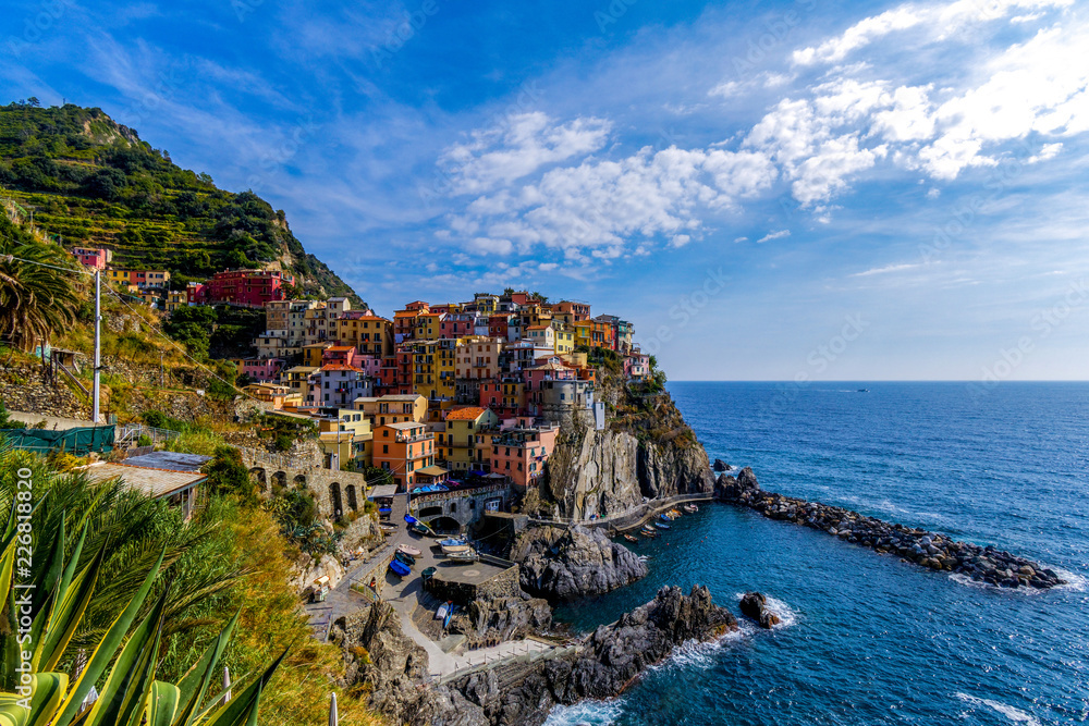 Colorful cityscape on the mountains over Mediterranean sea, Cinque Terre, Italy 