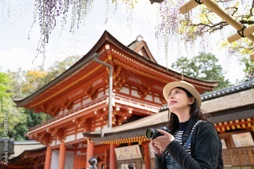 traveler taking photo of the flowers