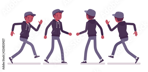 Young black man walking and running