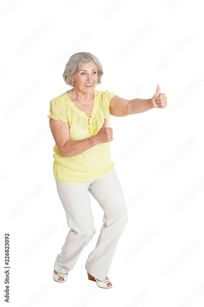 Portrait of senior woman with thumbs up Portrait of senior woman with thumbs up