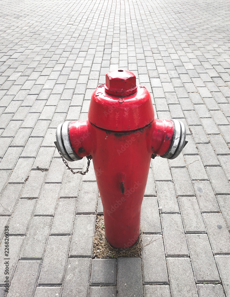 Metal red hydrant on the stove used to extinguish the fire Metal red hydrant on the stove used to extinguish the fire