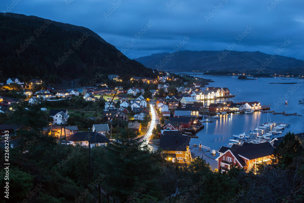A wonderful Night shot of a city and harbor in Norway. beautiful landscape and light with sunset