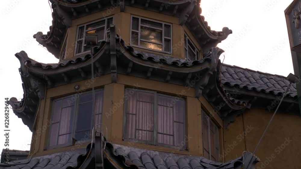CHINATOWN PAGODA APARTMENT ESTABLISHING SHOT. 4K SLIDER SHOT CHINATOWN PAGODA APARTMENT ESTABLISHING SHOT. 4K SLIDER SHOT