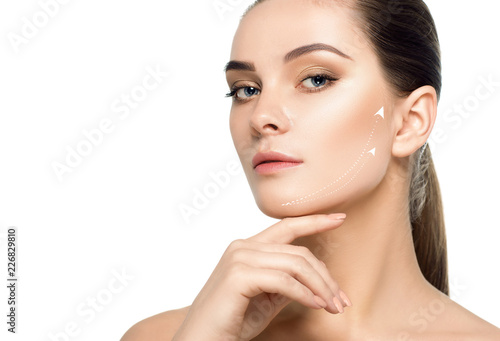 face with lifting arrows on skin showing facelift effect