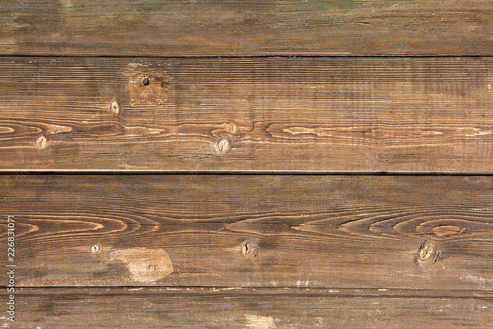 Light Brown Wood Texture Or Background Old Panels. Close Up Of Wall Made Of Wooden Planks. Light Brown Wood Texture Or Background Old Panels. Close Up Of Wall Made Of Wooden Planks.