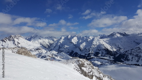 Image of ski resort in the winter with snow covered mountains and slops © Alex