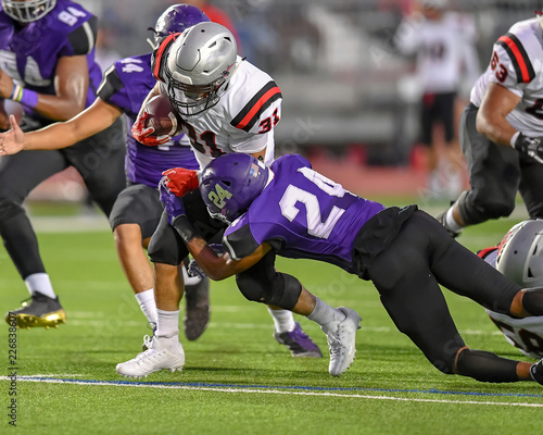 High School Football player in action during a game in South Texas