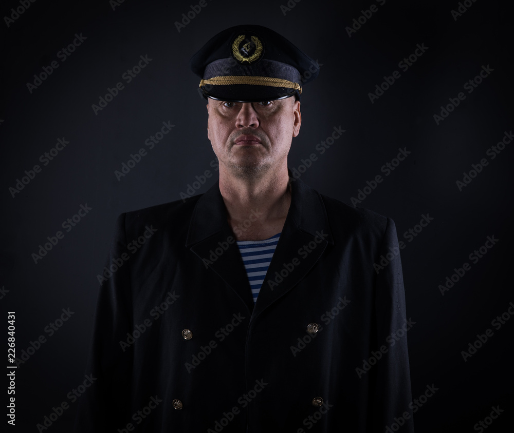 portrait captain of the ship on a black background portrait captain of the ship on a black background