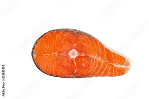Big piece of red fish on white background. Piece of salmon. Isolated on white