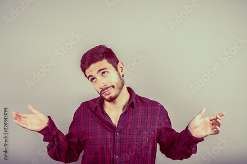 Bilde på lerret Closeup portrait young handsome, happy, smiling, conformist man, worker giving ok sign with hands