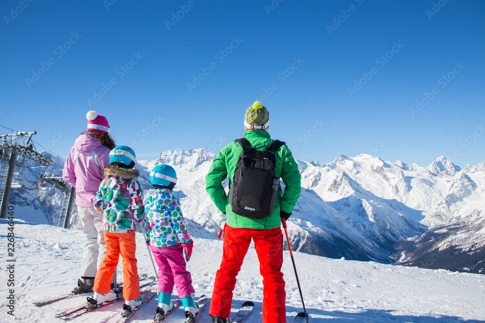 family in alpin ski resort