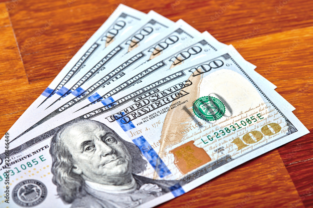 Dollars Closeup Concept. American Dollars Cash Money. One Hundred Dollar Banknotes. Dollars Closeup Concept. American Dollars Cash Money. One Hundred Dollar Banknotes.