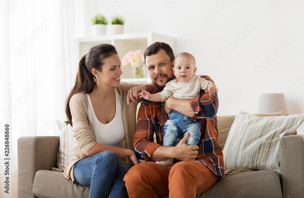 family, parenthood and people concept - happy mother, father with baby at home family, parenthood and people concept - happy mother, father with baby at home