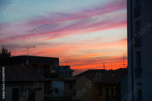 Red sunset in the city, Italy