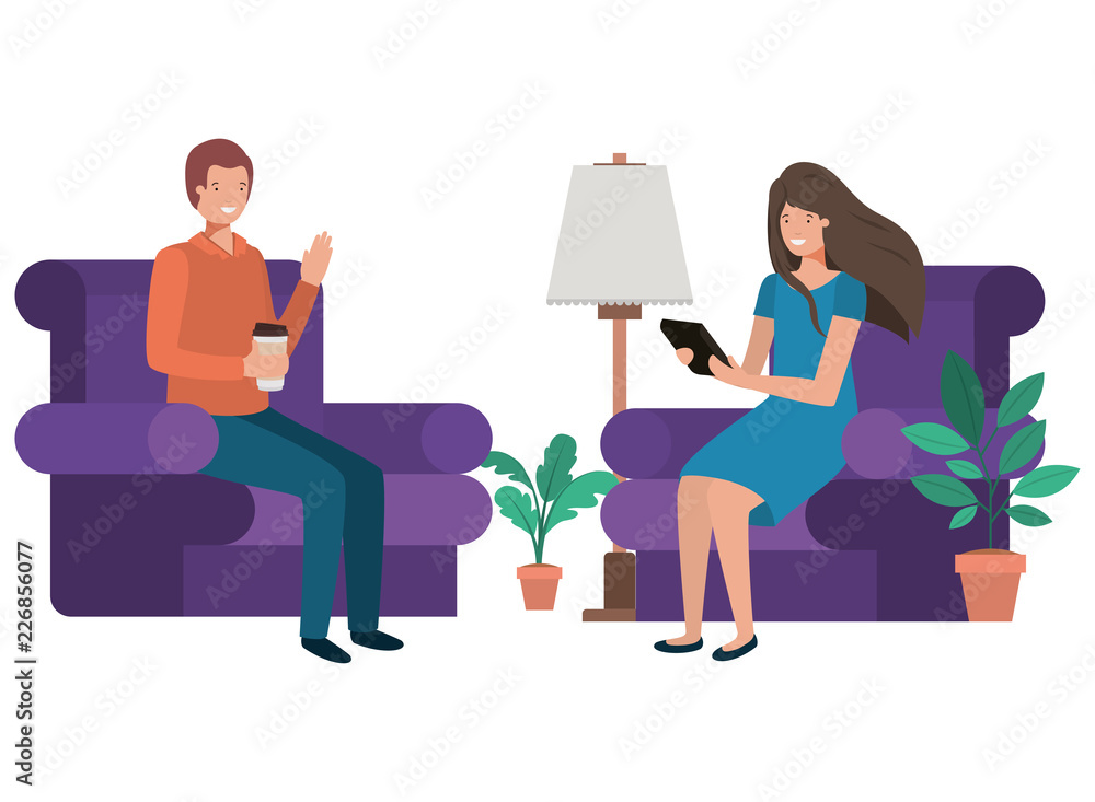 couple sitting in the living room with container coffee couple sitting in the living room with container coffee