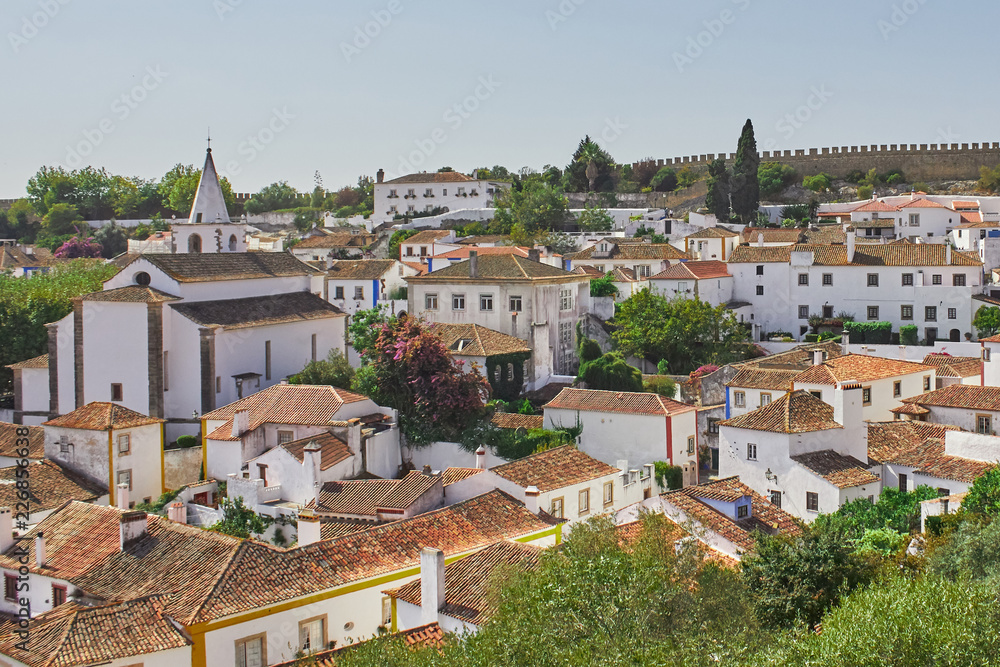 Authentic cityscape of Obidos, Portugal. Town surrounded by wall