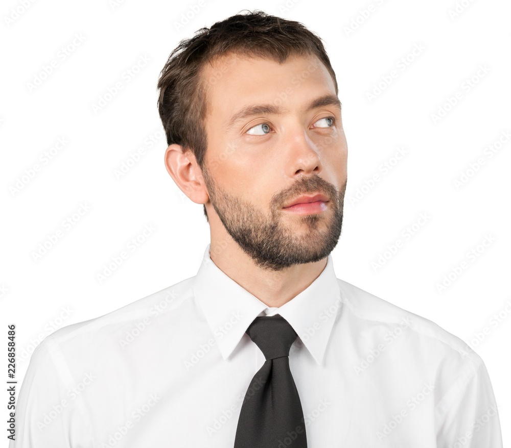 Portrait of a Confident Businessman Looking Sideways Portrait of a Confident Businessman Looking Sideways