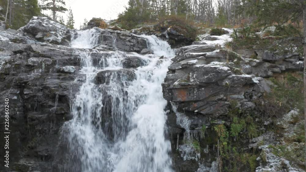 Beautiful mountain waterfall. Place of rest travelers. Beautiful mountain waterfall. Place of rest travelers.