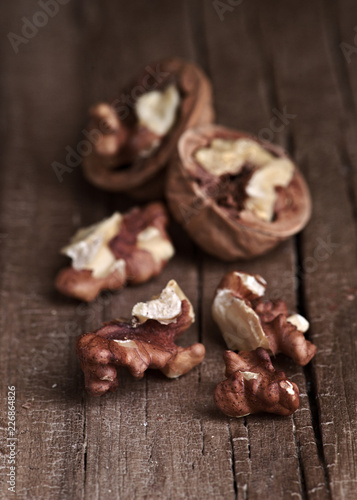 group of nuts on natural wood board