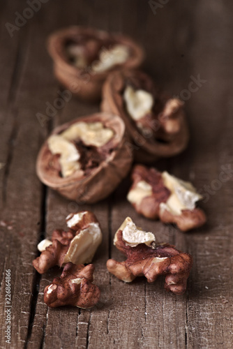 group of nuts on natural wood board