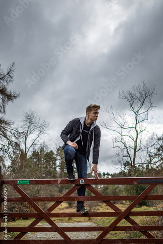 Hopping a Fence with Dramatic Sky